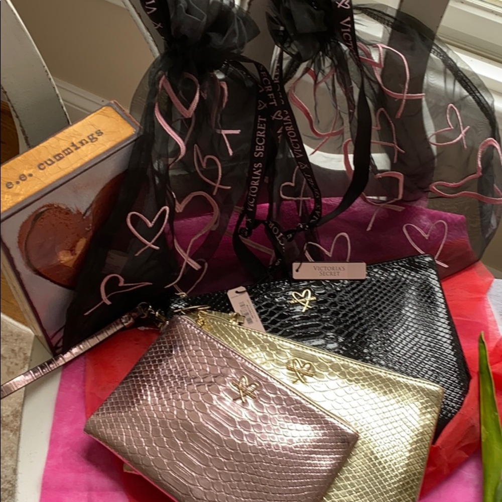 Victoria Secret bags and triple cosmetic cases